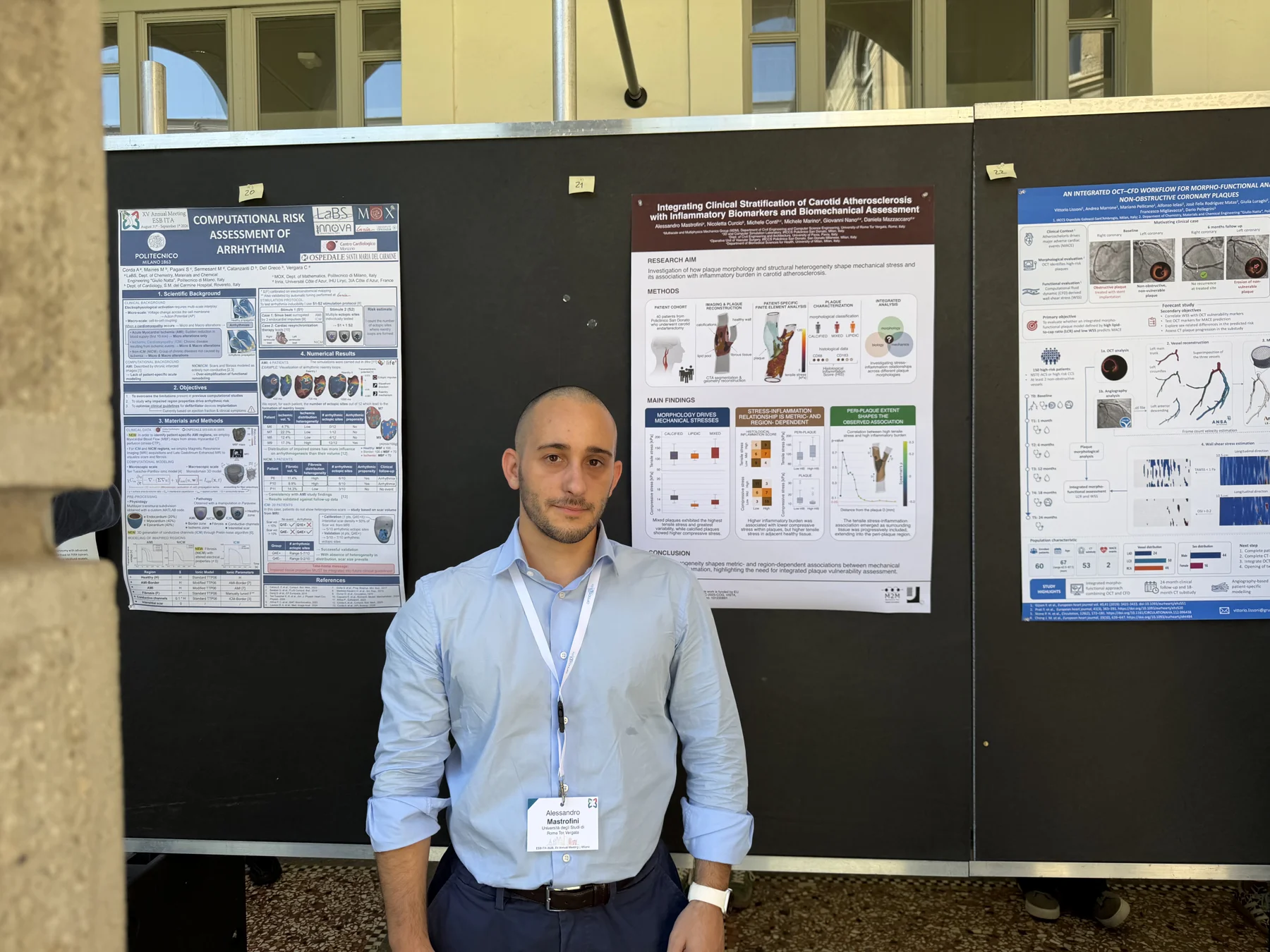 Presenting research at a poster session in Milan